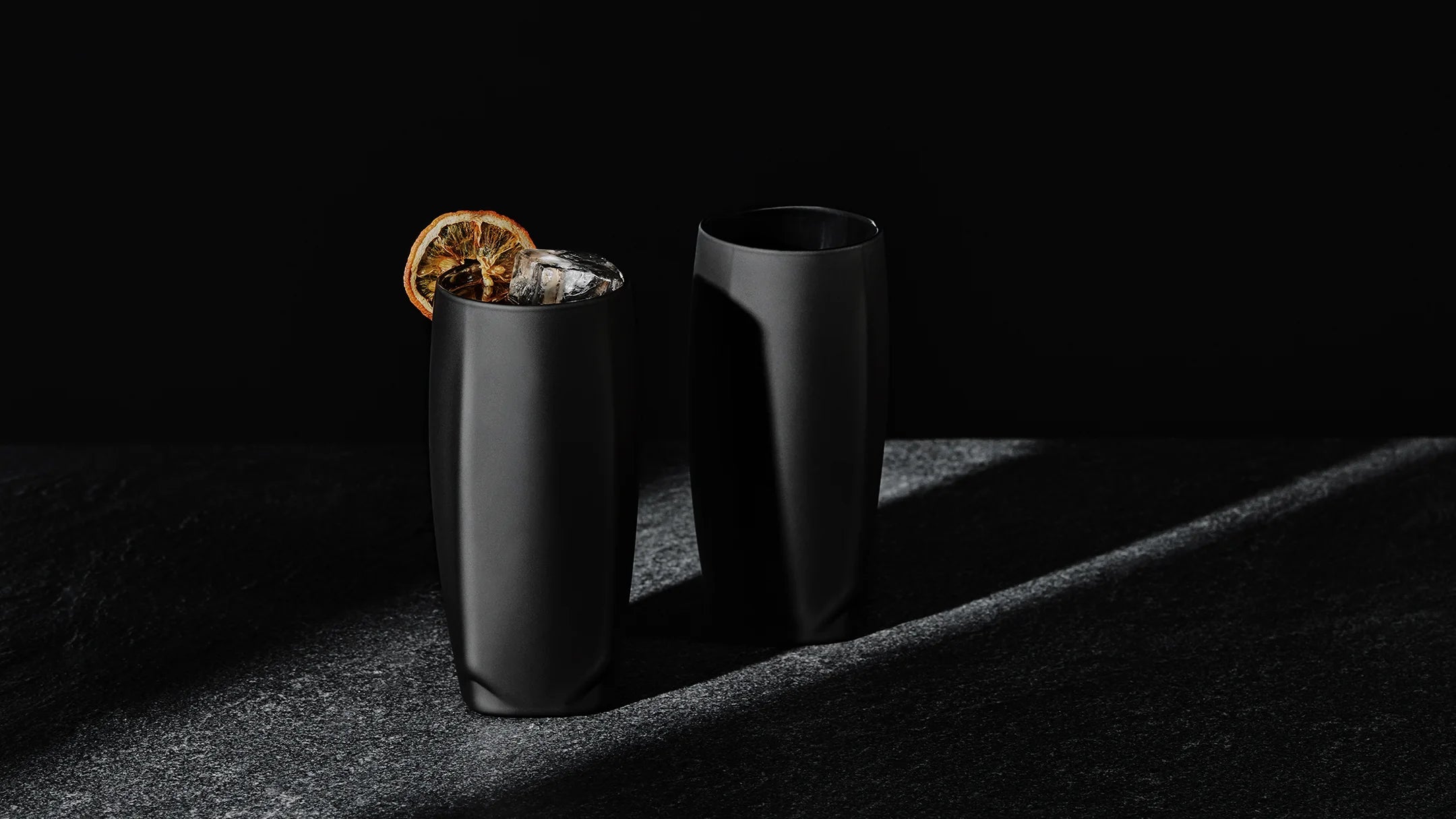 A highball glass set of the Norlan Vawe in the Vaild matte black finish.