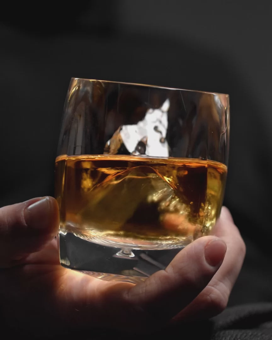 Looping video of a Rauk Heavy Tumbler, 250 mL clear in use — showcasing the ritual enjoyment of whiskey on-the-rocks.